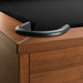 Black Crate & Barrel Walnut Pool Table with Wall Rack and Accessories in close up on a corner pocket showing the black leather drop pocket, black felt and the walnut rail