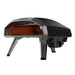 Black Ooni Koda 2 Pizza Oven angled left view with the orange glowing interior and the gas control knob on the side.