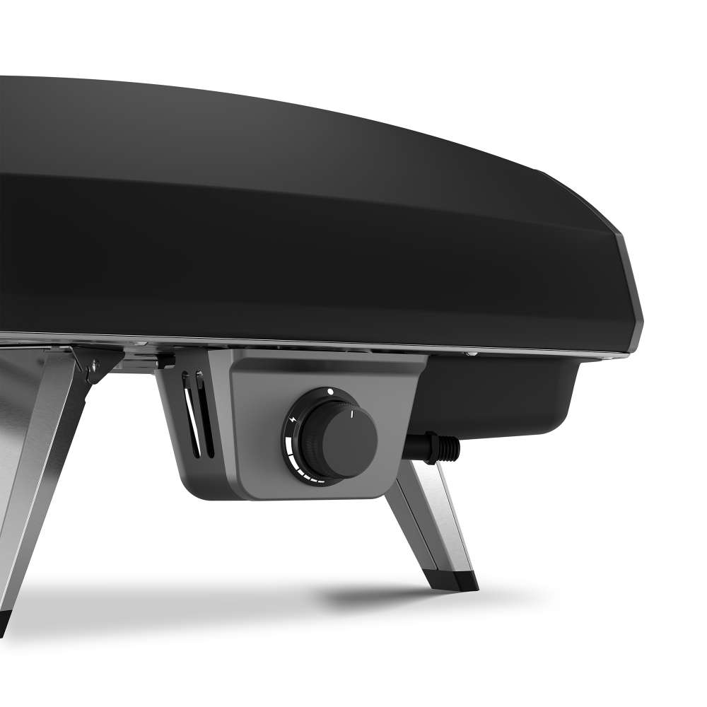 Black Ooni Koda 2 Pizza Oven close view of the left flank and the silver gas control knob under the body.