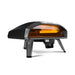 Black Ooni Koda 2 Pro Pizza Oven angled front view with the glowing orange interior and the digital display reading 950.