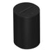 Black Sonos Era 100 Next-Gen Smart Speaker angled view of the cylindrical speaker showing its perforated grille and the touch controls on the flat top on a white background