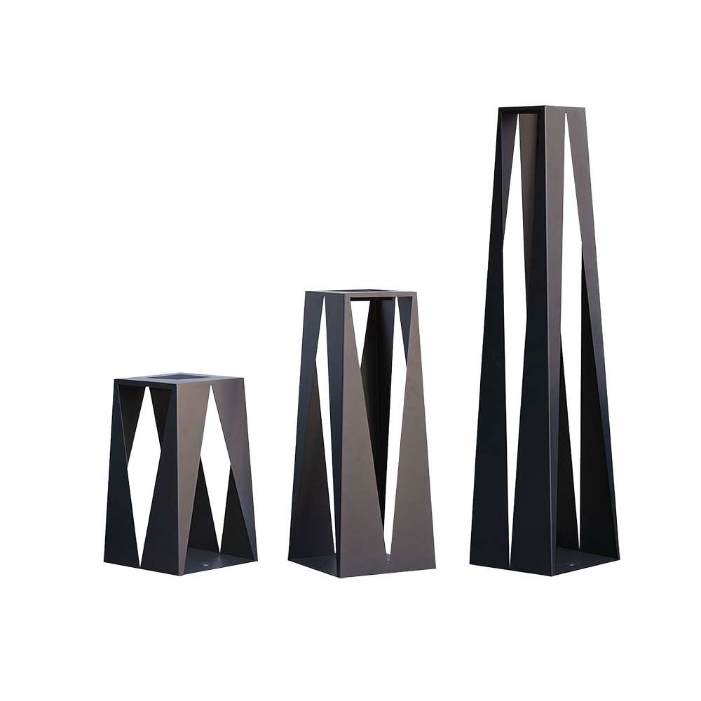 Cafe Brown Crate & Barrel Teatree Cafe Metal LED Solar Outdoor Lantern in carbon steel with cutaways through the triangular frame, shown in the first alternate view