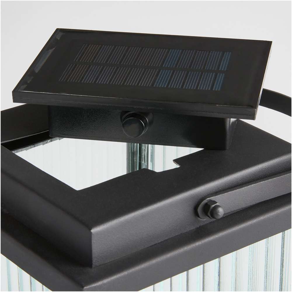 Crate & Barrel Alfresco Black Metal and Glass LED Solar Outdoor Lantern group shown from an alternate angle
