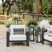 Crate & Barrel Walker Black Metal Outdoor Lantern with warm pillar candle for ambient outdoor lighting