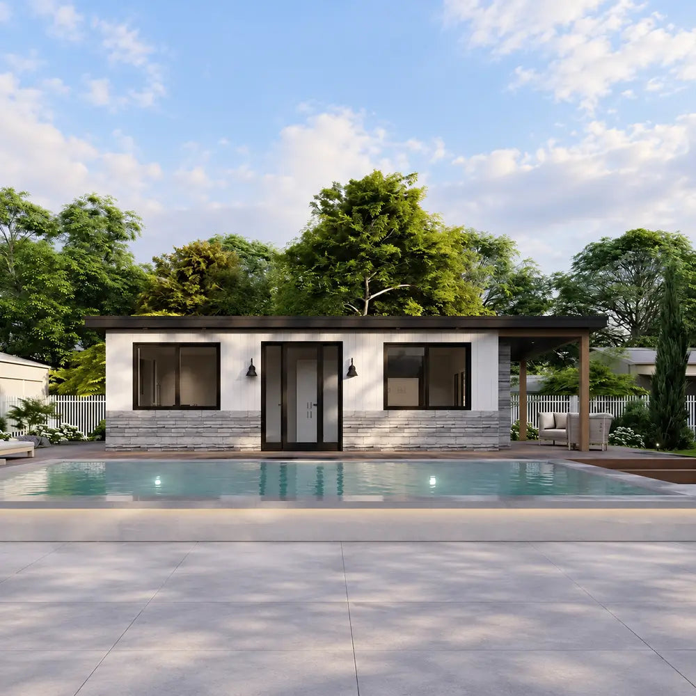Symmetrical front view of the Tremblant Garden Suites featuring white siding, stone and wood finishes, black-framed windows, a central glass door, covered patio, and pool.