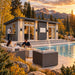 Angled view of the Muskoka one-bedroom Freedom Suite at golden hour, with adults enjoying drinks around a poolside fire table and side bar amid golden aspens and Colorado mountain scenery.