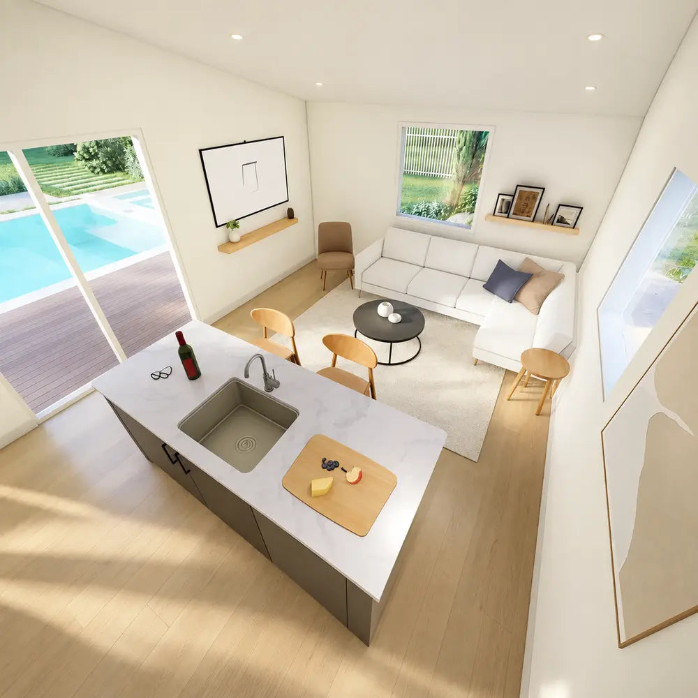 Bright Banff Garden Suites interior with a sleek kitchen island overlooking modern living-room seating, floor-to-ceiling windows, and a private pool.