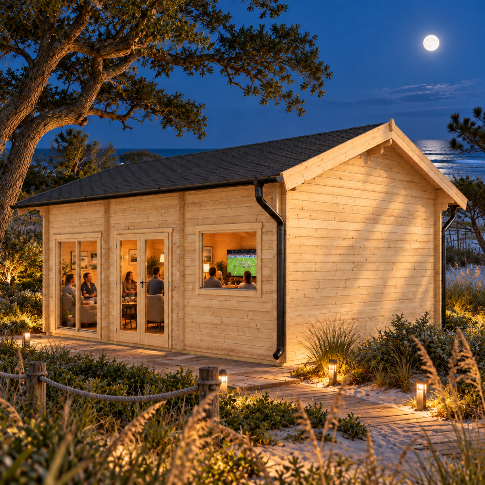 Britt 44 sports room illuminated at night among live oaks, maritime pines, sea oats, and coastal dunes on North Carolina’s Outer Banks.