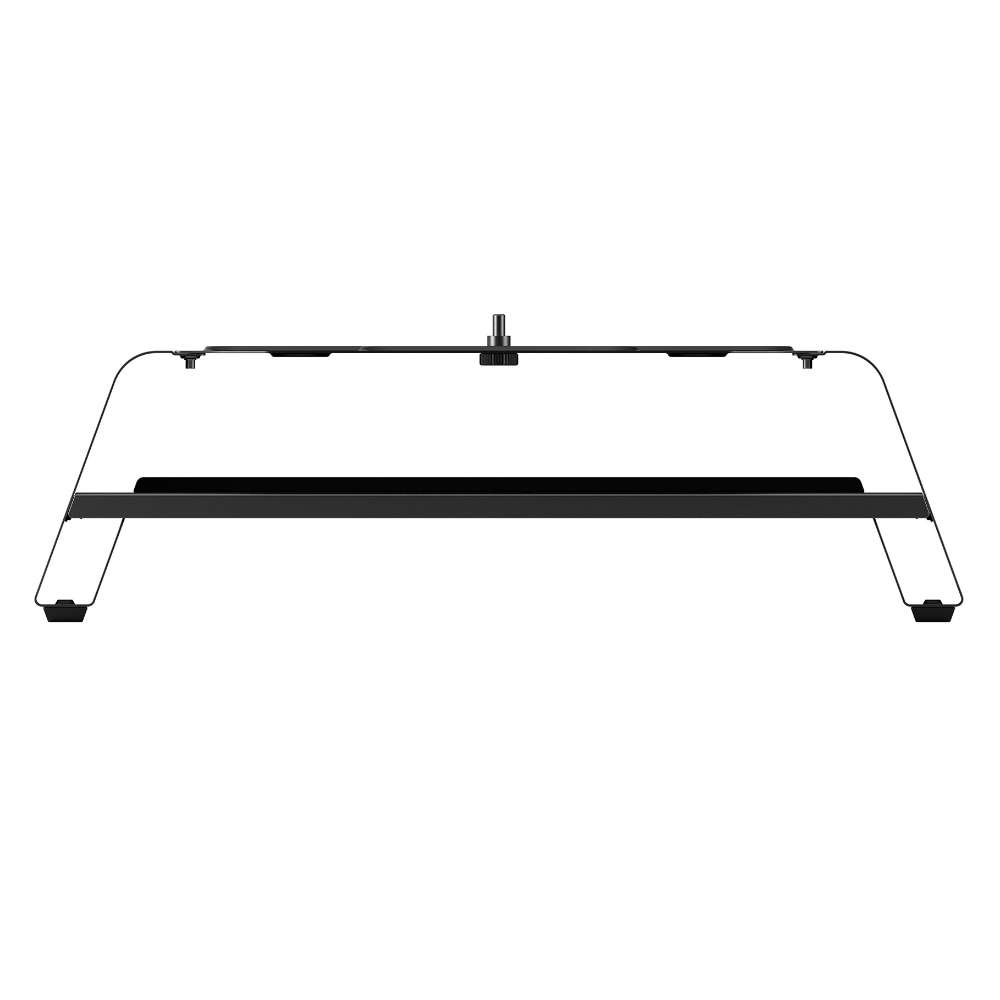Gozney Arc Pizza Oven Booster in profile on white showing its low black silhouette and the feet at each end.
