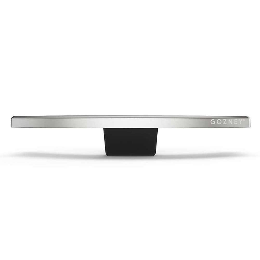 Gozney Arc Pizza Oven Mantel on white seen from the front showing the slim stainless ledge with the Gozney wordmark and the black bracket beneath.