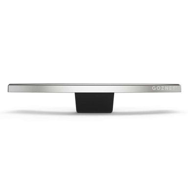 Gozney Arc Pizza Oven Mantel on white seen from the front showing the slim stainless ledge with the Gozney wordmark and the black bracket beneath.
