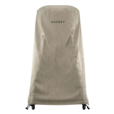 Gozney Arc Pizza Oven + Stand Cover on white showing the tall stone-colored canvas cover fitted over the oven and stand with the Gozney wordmark near the top and casters at the base.
