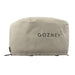 Gozney Arc Pizza Oven XL Cover angled on white showing the stone-colored canvas the Gozney wordmark and the toggle at the bottom hem.