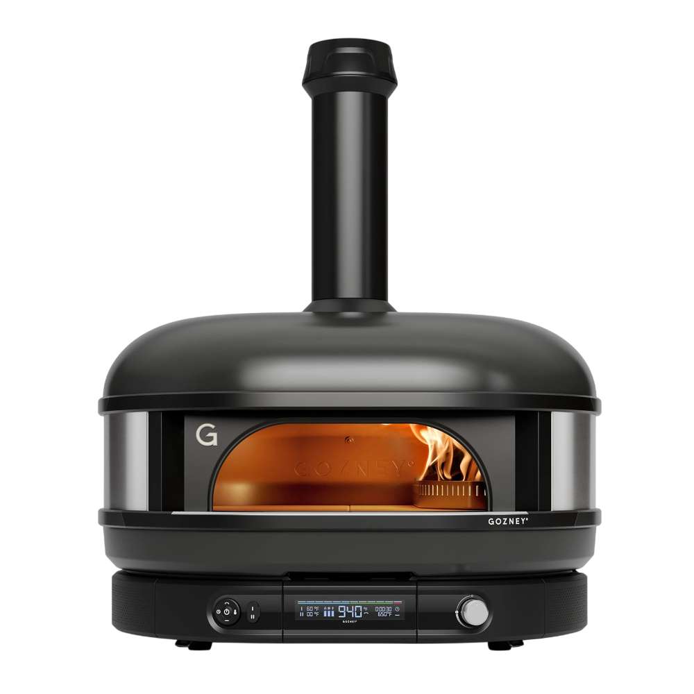 Gozney Dome Gen 2 Natural Gas Pizza Oven straight-on front view on white with the chimney on top a flame inside the copper-toned dome and the control panel reading 940.