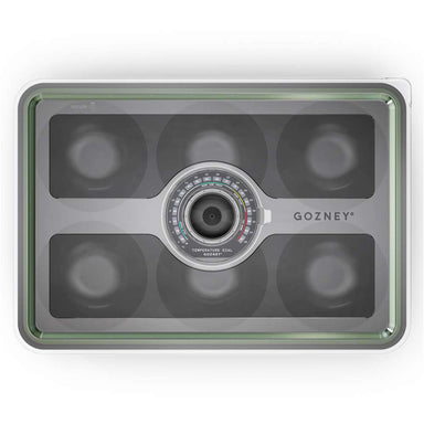 Gozney Pizza Dough Tray overhead view on white of the clear lid showing the six round wells beneath and the Gozney wordmark beside the central dial.