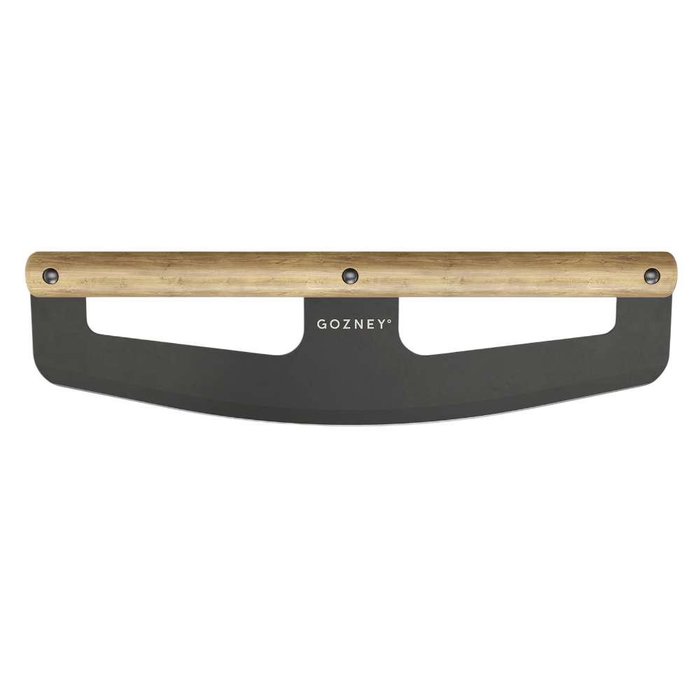 Gozney Pizza Rocker straight-on view on white of the curved black blade with its light wood handle bar and the Gozney wordmark on the face.