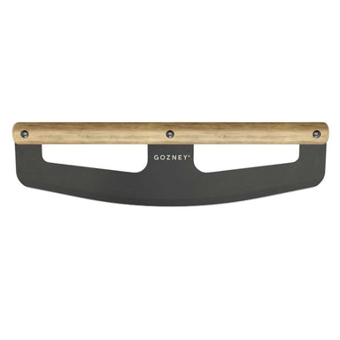 Gozney Pizza Rocker straight-on view on white of the curved black blade with its light wood handle bar and the Gozney wordmark on the face.