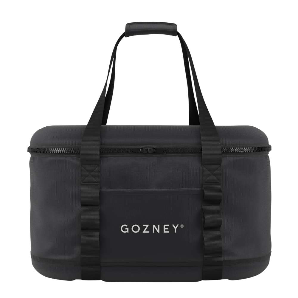 Gozney Tread Travel Bag on white from the front showing the black padded bag with two carry handles and the Gozney wordmark.