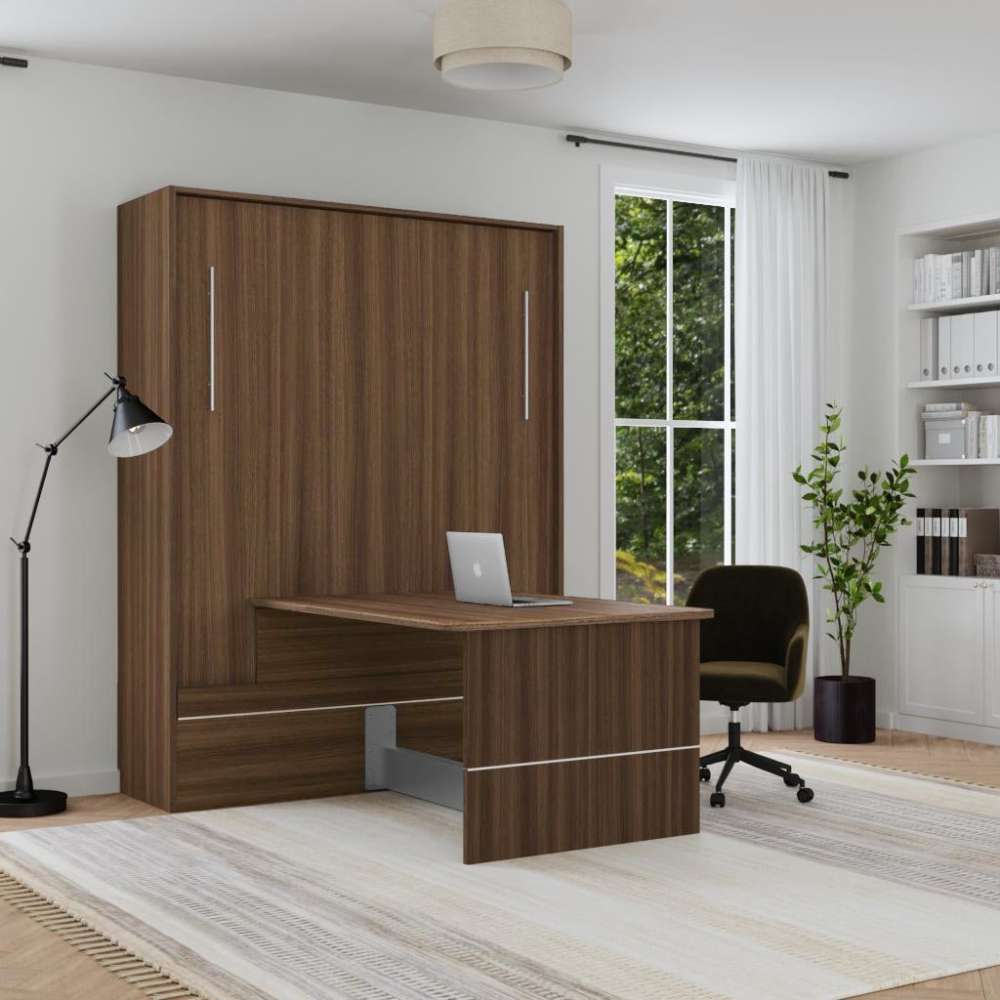 Modern Walnut Inovabed Murphy Bed with Desk closed in a bright room set up as a home office, with a laptop on the table and a black office chair pulled up to it