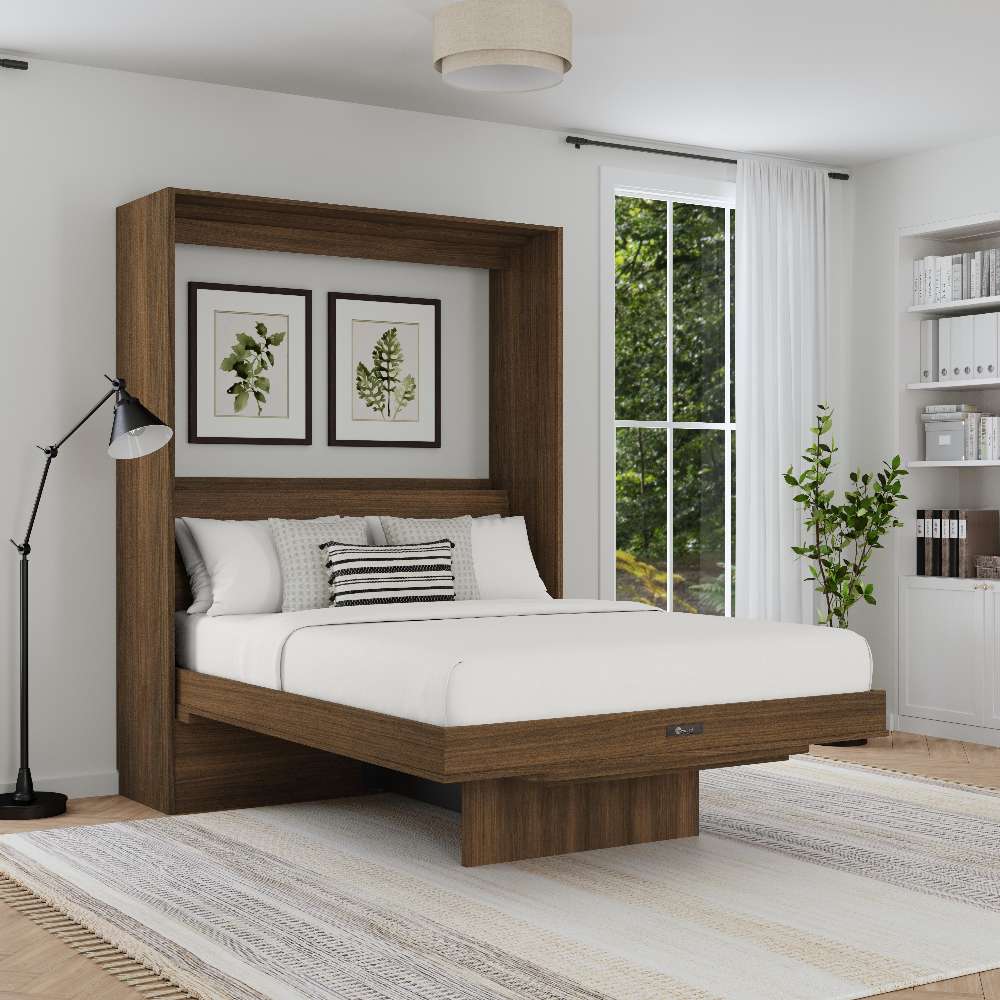 Modern Walnut Inovabed Murphy Bed with Desk opened in a bright bedroom with white bedding, a striped lumbar pillow and two framed botanical prints above the headboard