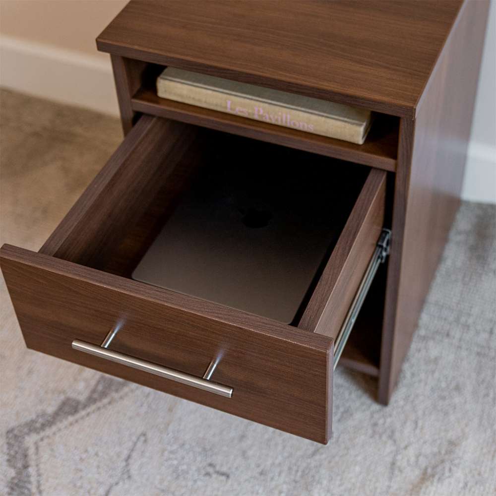Modern Walnut Inovabed Wall Bed with Sofa and Two Nightstands in close-up with a nightstand drawer pulled open on a laptop stored inside