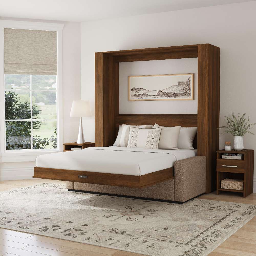 Modern Walnut Inovabed Wall Bed with Sofa and Two Nightstands opened in a bright room between two nightstands, with white bedding and a framed landscape print above the headboard