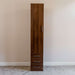 Modern Walnut Inovabed Wall Bed with Table and Two Narrow Flex Cabinets showing one Narrow Flex Cabinet closed against a wall, with a tall door above three drawers