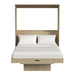Natural Oak Inovabed Murphy Bed with Desk seen head-on on a white background, opened with two white pillows, white bedding and the folded table below the foot of the bed