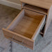 Natural Oak Inovabed Wall Bed with Sofa and Two Nightstands in close-up with a nightstand drawer pulled open and empty