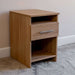 Natural Oak Inovabed Wall Bed with Sofa and Two Nightstands showing one nightstand at an angle against a wall in a carpeted room