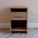 Natural Oak Inovabed Wall Bed with Sofa and Two Nightstands showing one nightstand head-on against a wall in a carpeted room