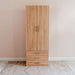 Natural Oak Inovabed Wall Bed with Sofa and Wide Flex Cabinet showing the Wide Flex Cabinet closed against a wall in a carpeted room