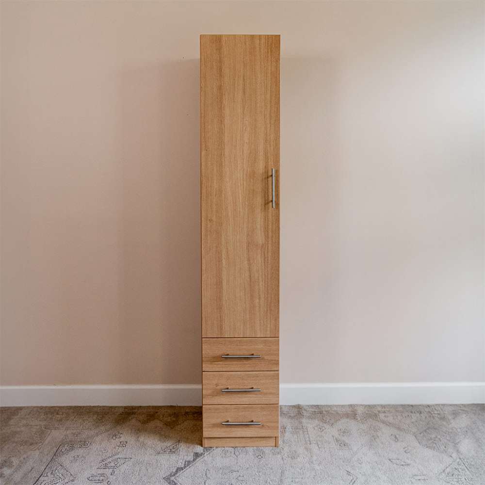Natural Oak Inovabed Wall Bed with Table and Two Narrow Flex Cabinets showing one Narrow Flex Cabinet closed against a wall, with a tall door above three drawers
