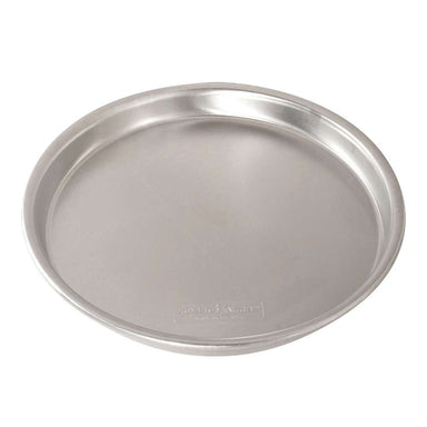 Nordic Ware Naturals 14" Deep Dish Pizza Pan angled on white showing the deep sidewall the smooth base and the Nordic Ware stamp.