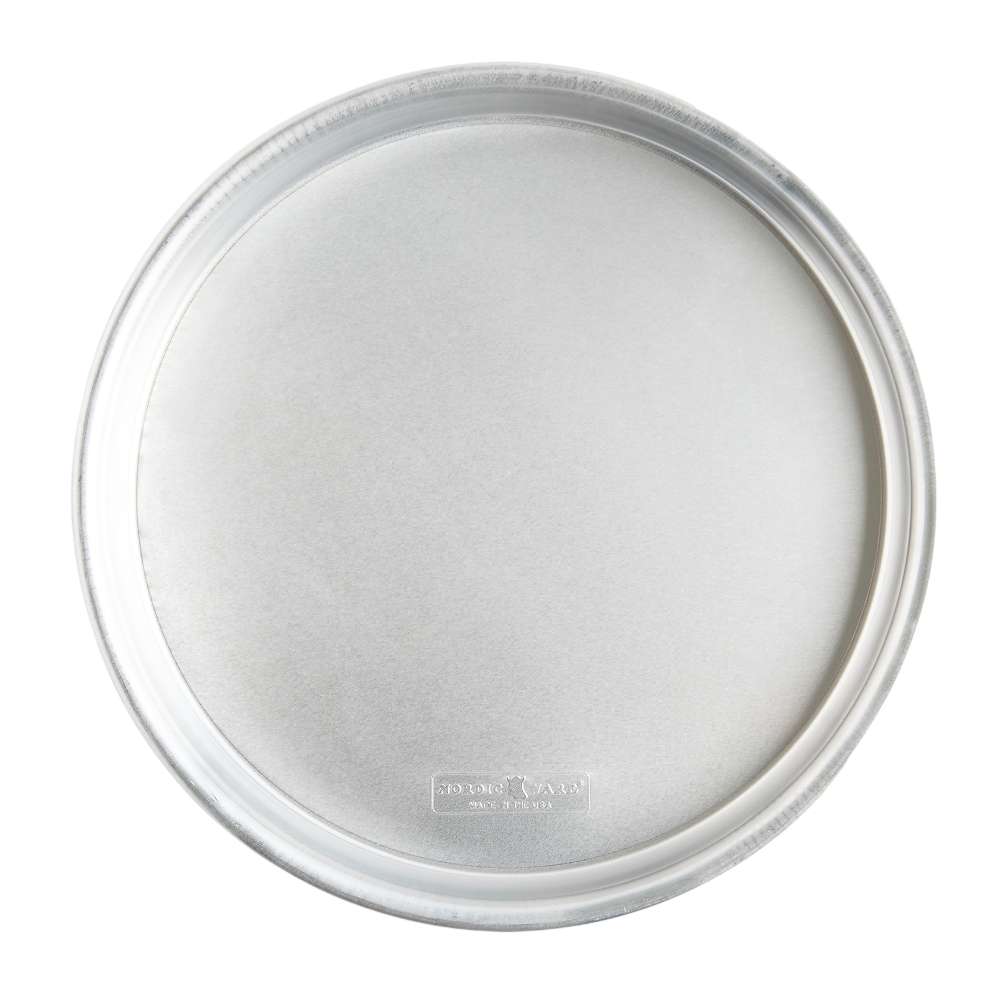 Nordic Ware Naturals 14" Deep Dish Pizza Pan seen from above on white showing the round natural aluminum pan with its deep straight sides and the Nordic Ware stamp.