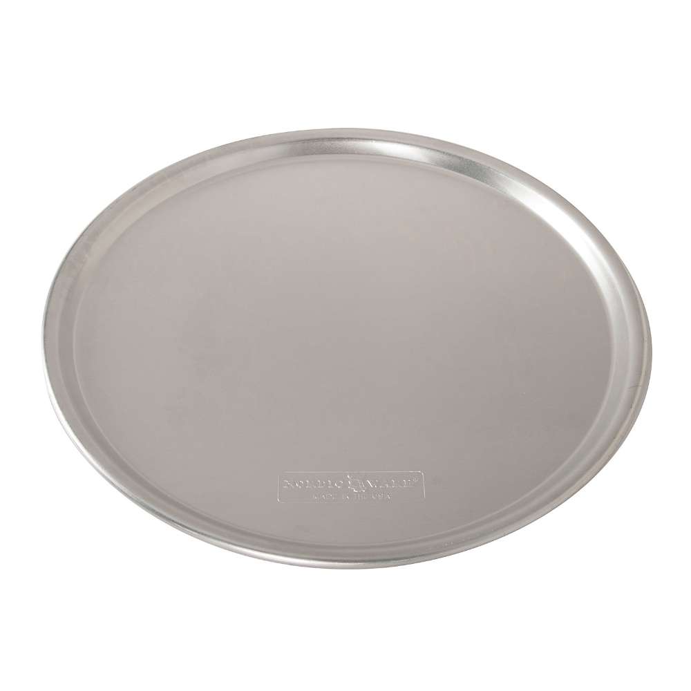 Nordic Ware Naturals 14" Traditional Pizza Pan angled on white showing the smooth base and the Nordic Ware stamp near the edge.