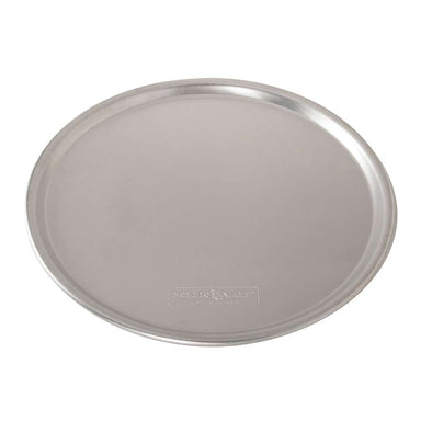 Nordic Ware Naturals 14" Traditional Pizza Pan angled on white showing the smooth base and the Nordic Ware stamp near the edge.