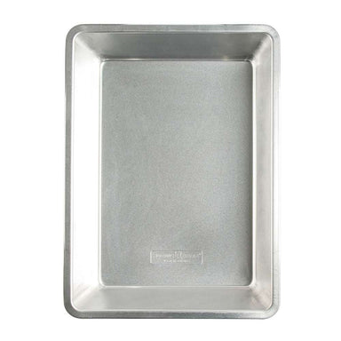 Nordic Ware Naturals Detroit-Style Pizza Pan seen from above on white showing the rectangular natural aluminum pan with straight sides and the Nordic Ware stamp in the base.