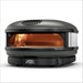 Off-Black Gozney Arc XL Pizza Oven angled view on white with an orange flame burning inside the copper-toned dome and the display reading 450.