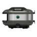 Off-Black Gozney Tread Pizza Oven side profile on white showing the brushed stainless side panel with its round temperature gauge and the gas fitting below.