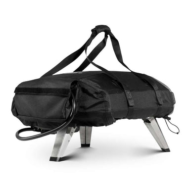 Ooni Koda 2 Carry Cover fitted over an oven seen from the rear right in all black with the ooni logo, carry straps over the top and the gas hose looped out below.