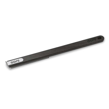 Ooni Pizza Oven Brush seen from behind showing the flat black handle with the ooni logo and the stainless scraper end.