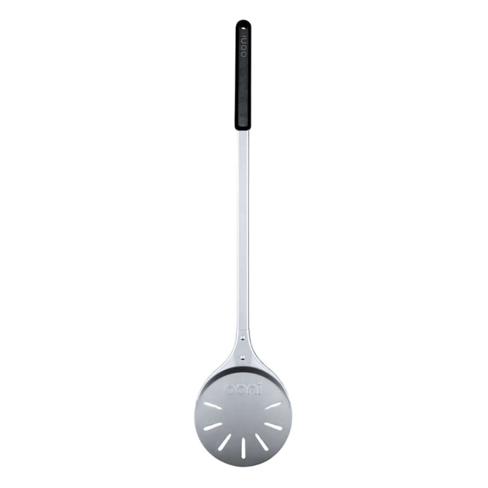 Ooni Pizza Turning Peel shown upright with its small round perforated stainless head and long black handle.