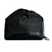 Ooni Table and Pizza Oven Cover packed into its black drawstring storage bag with the ooni logo on the front.