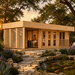 Wooden Texas Hill Country Sauna Largo 90 at golden hour with two adults inside and colorful koi swimming in a garden pond.