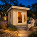Illuminated Sauna Li 90 on a bright Texas evening with one person meditating inside and another cooling down outside.