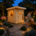 Illuminated Sauna Maria 90 on a bright Texas evening with one guest meditating inside and another arranging towels outside.