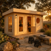 Sauna Sahib 70 glowing at golden hour with two adults stretching and cooling down inside a landscaped Texas Hill Country retreat.