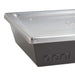 Small Ooni Detroit Pizza Pan close-up of one corner where the brushed stainless steel lid overhangs the dark gray pan wall.