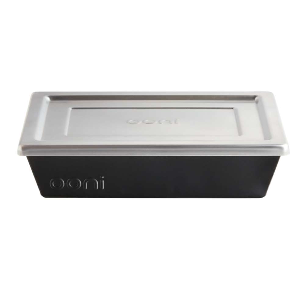 Small Ooni Detroit Pizza Pan front view on white with the stainless steel lid in place and the ooni logo embossed across the black pan.